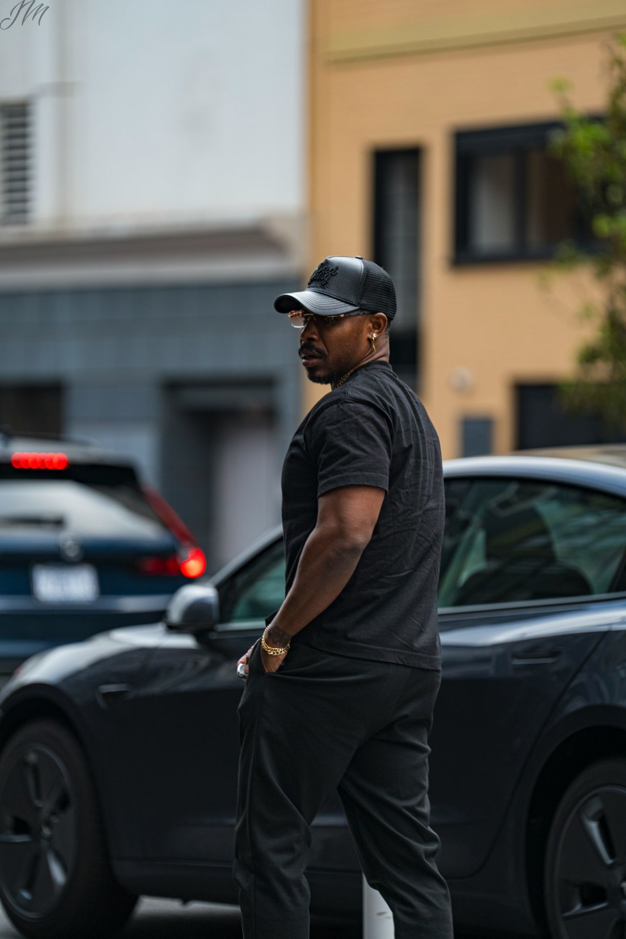 A man riding a skateboard on a city street